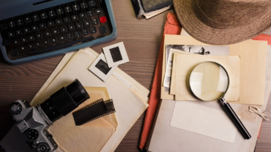 Investigative tools on a desk, representing the HR choice between mediation and investigation